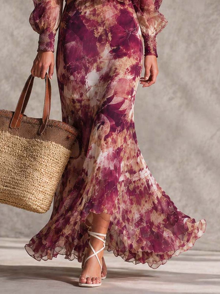 Vestido largo rosa de gasa con estampado floral y hombros descubiertos