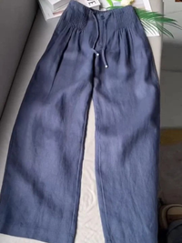 Pantalón fluido de pernera ancha