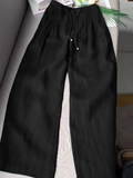 Pantalón fluido de pernera ancha