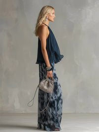 Conjunto de top de espalda descubierta azul marino y pantalón ancho estampado