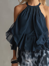 Conjunto de top de espalda descubierta azul marino y pantalón ancho estampado