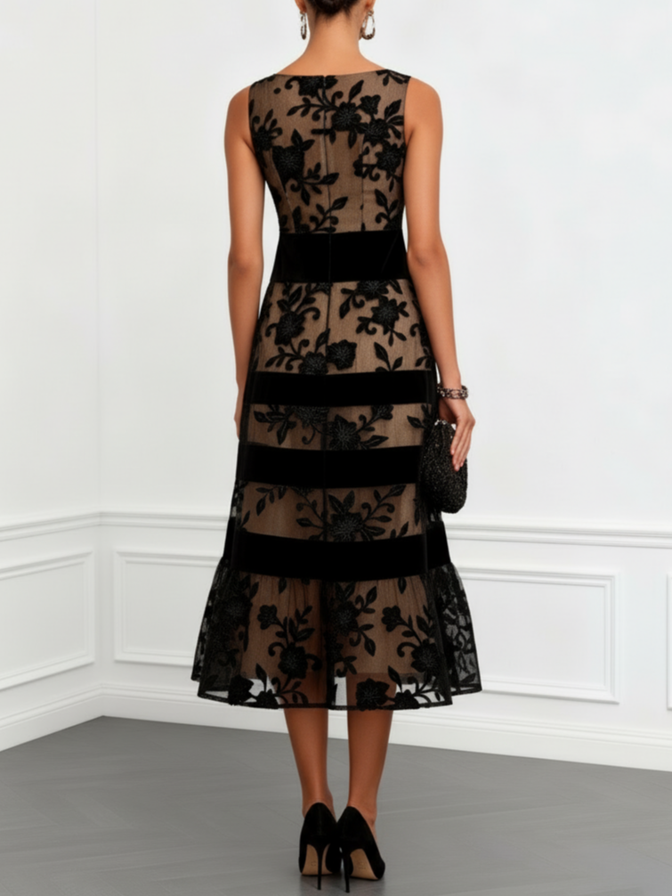 Vestido midi trapecio en tul negro con estampado floral