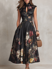 Vestido midi de satén plisado negro con estampado floral