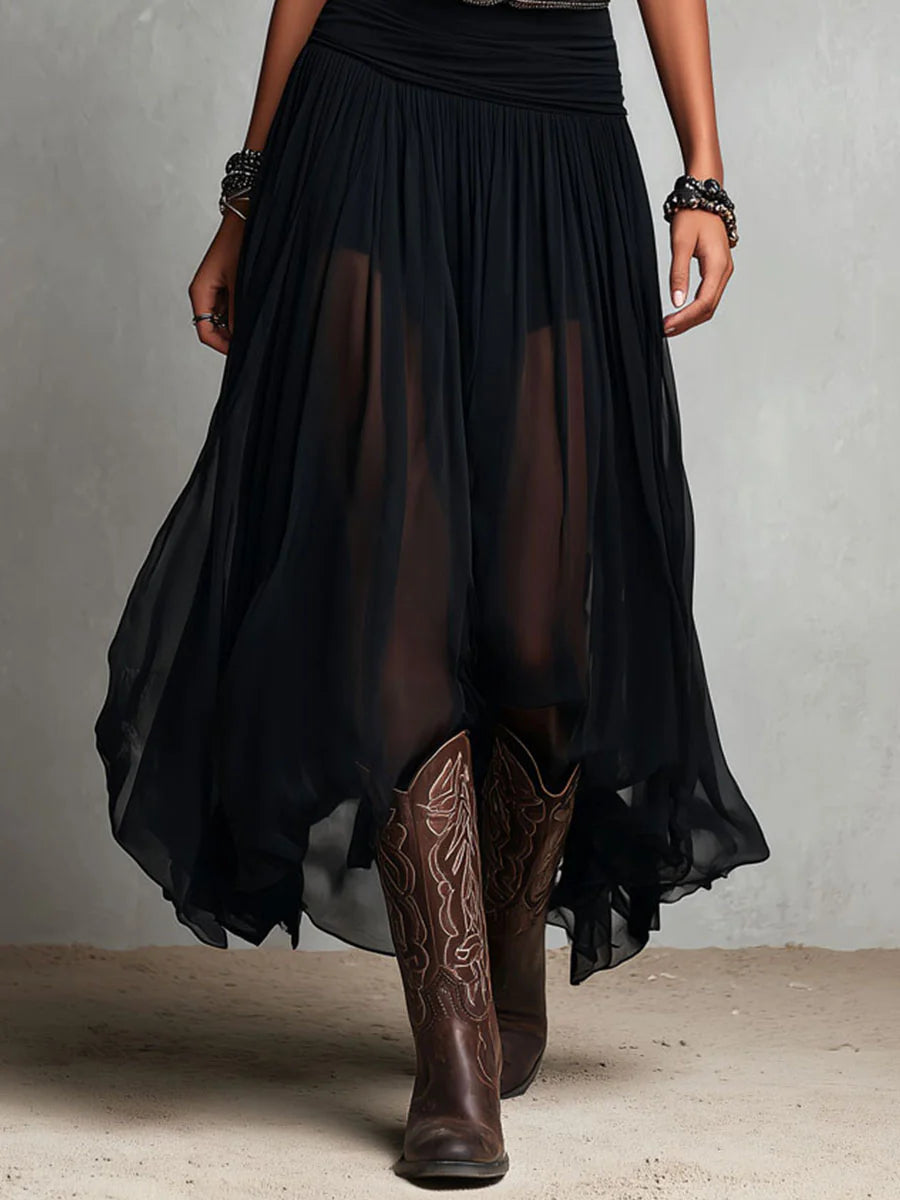Vestido largo negro sin mangas con falda de tul y cinturón