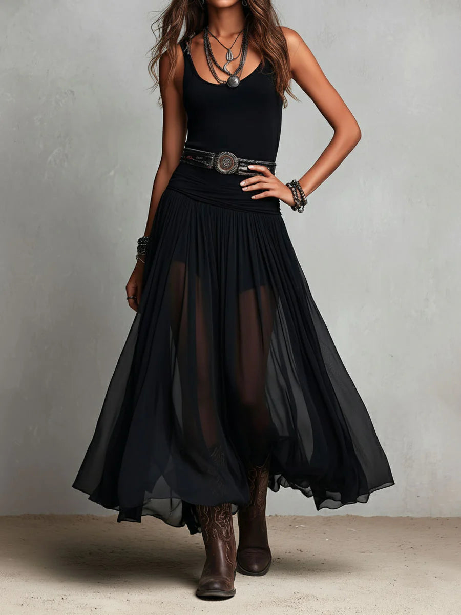 Vestido largo negro sin mangas con falda de tul y cinturón
