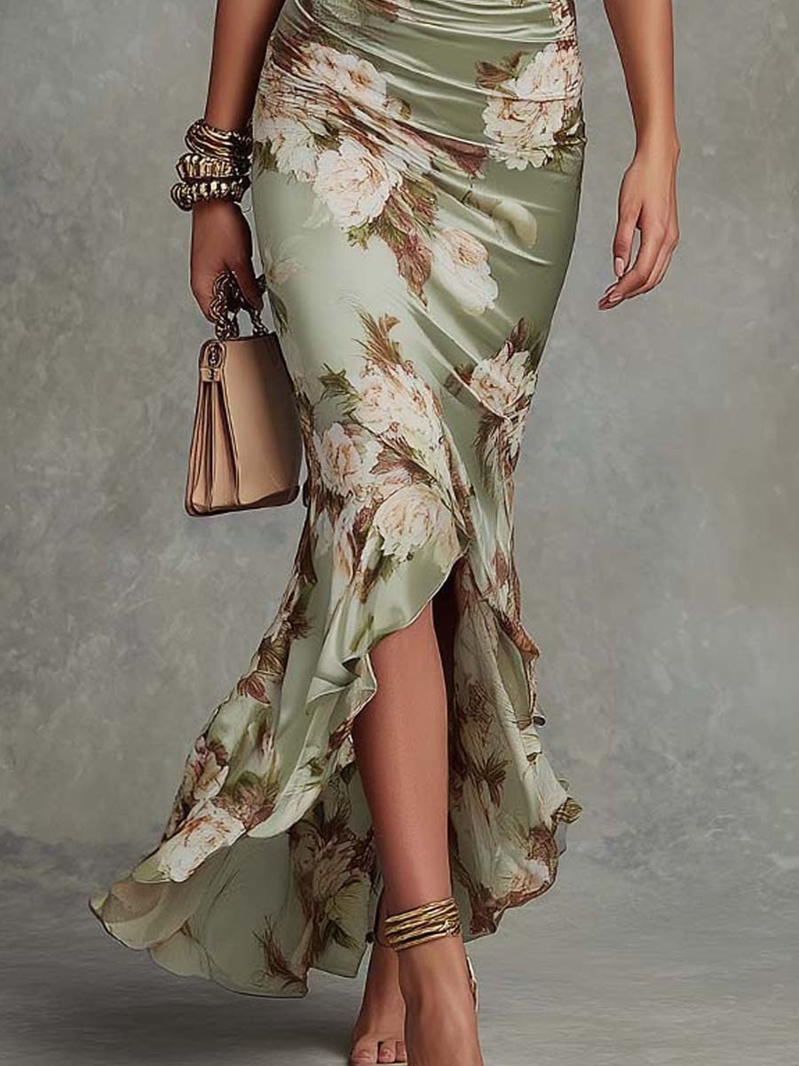 Vestido largo asimétrico de satén verde con estampado floral